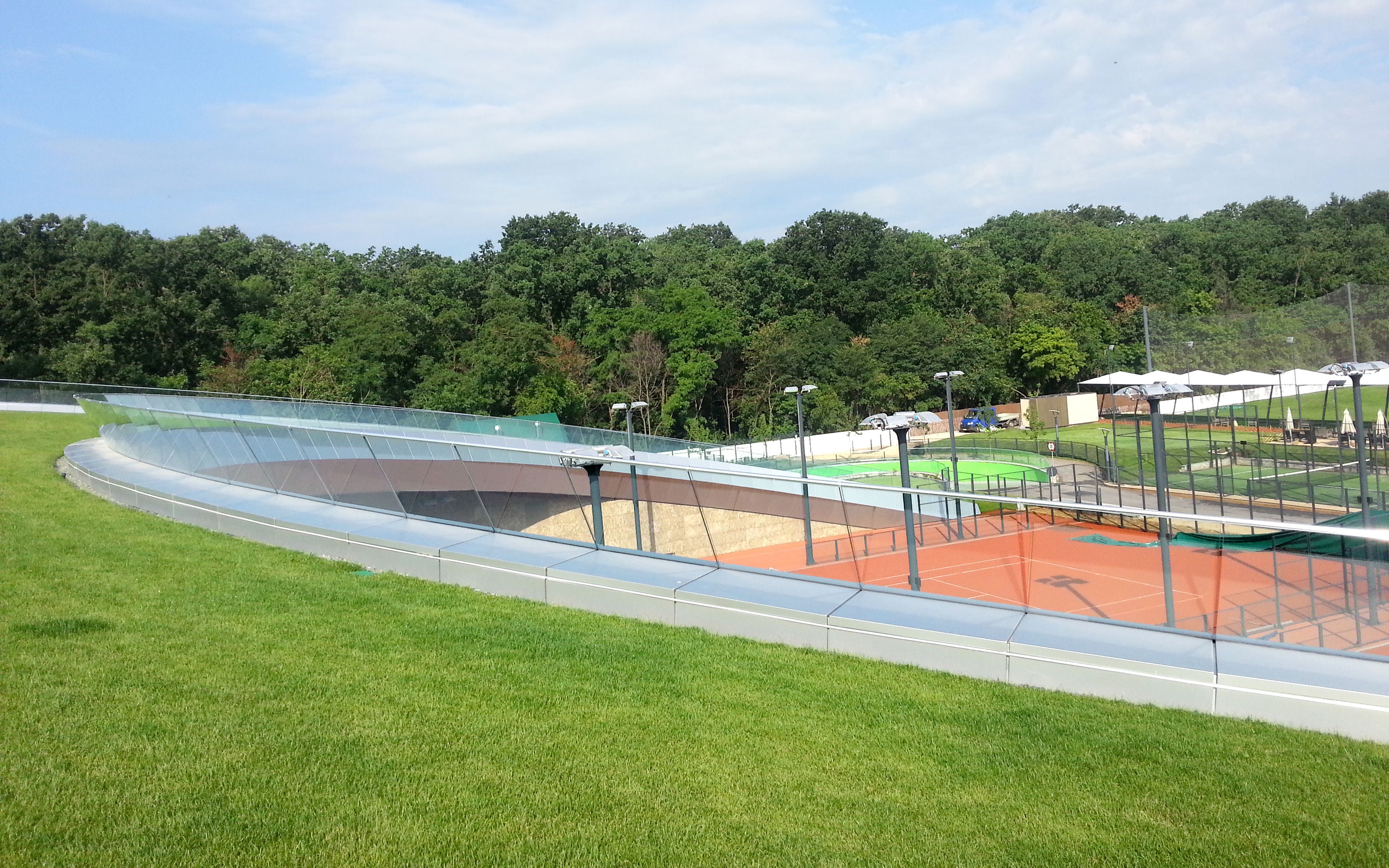 Green roof with lawn with view on sports facilities